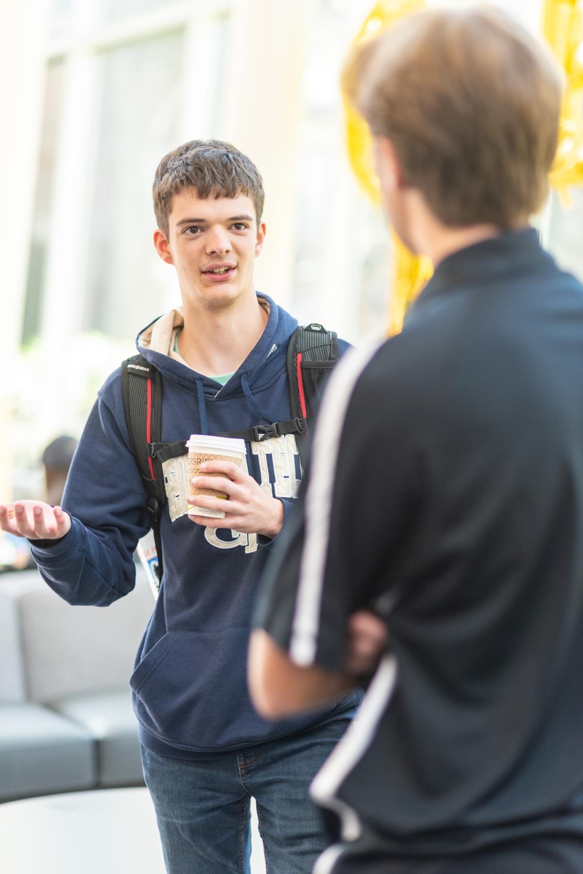 undegrad students in atrium