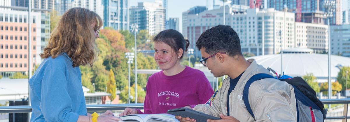 students outside building